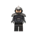 Gray and black rhino minifigure with armor, confident smirk, and movable arms and legs.