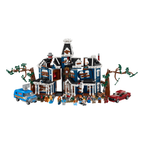 LEGO set featuring a blue house with white trim, minifigures, a red car, and a blue van surrounded by trees.
