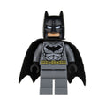 Batman minifigure with a black cape, gray body, and bat emblem, featuring a black cowl and facial details.