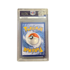 Trading card featuring a Poké Ball design, graded by PSA, encapsulated in a protective case.