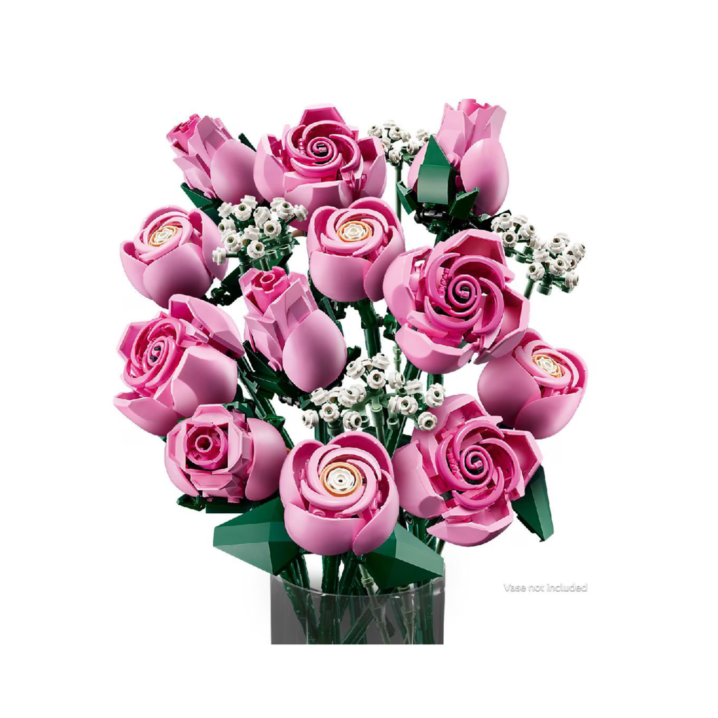 Bouquet of pink LEGO roses arranged with white flower accents in a clear vase (vase not included).