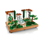 LEGO Fountain Garden set featuring a vibrant garden scene with a fountain, plants, flowers, and decorative seating areas.